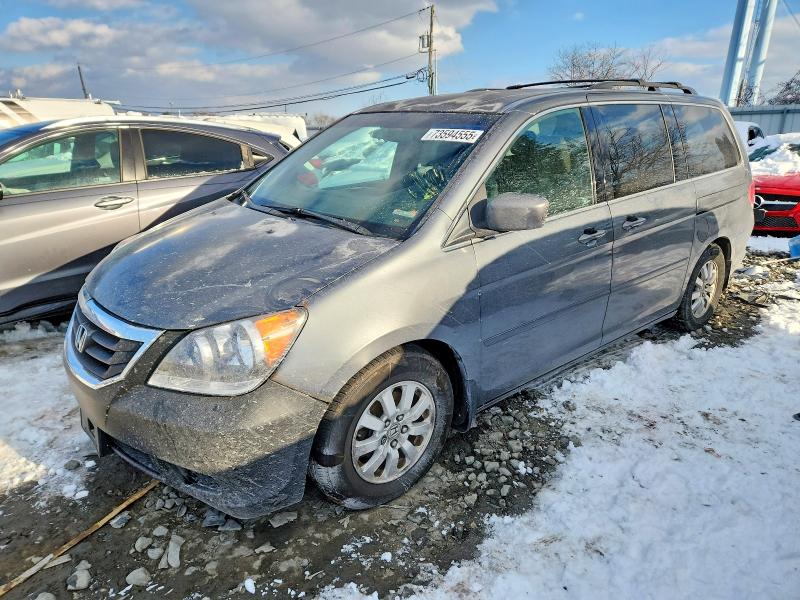 HONDA ODYSSEY 2010 with VIN 5FNRL3H48AB027862 - Photo from auction