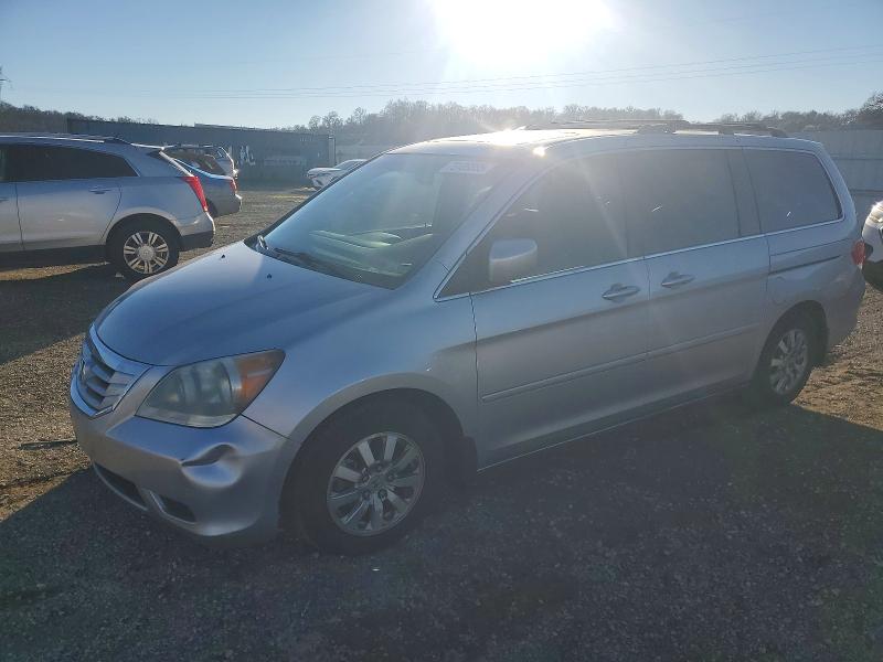 HONDA ODYSSEY 2010 with VIN 5FNRL3H76AB098858 - Photo from auction