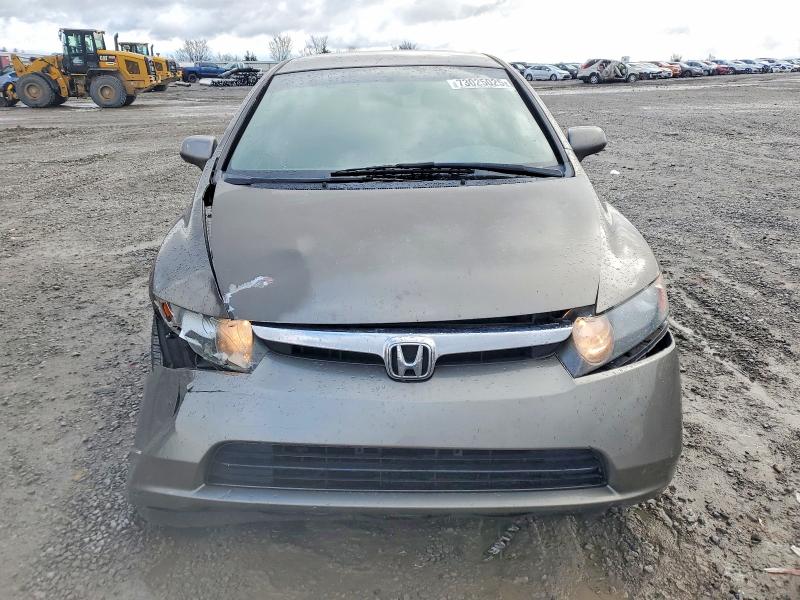 Photo 5 from auction – 2006 HONDA CIVIC LX with VIN JHMFA16516S003839