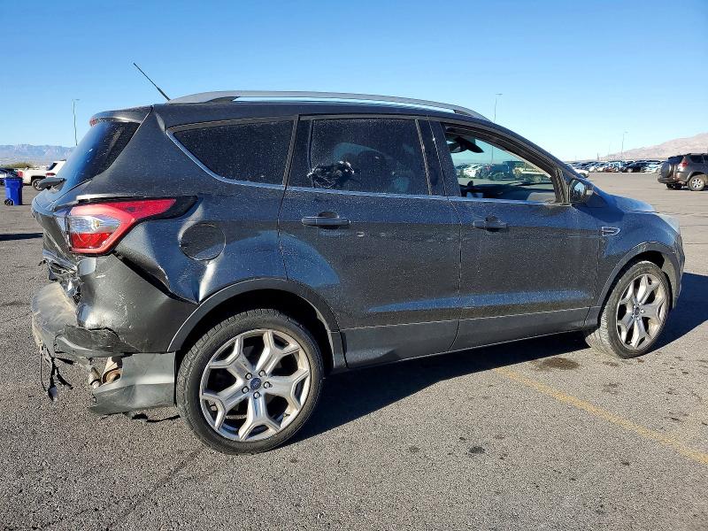 Photo 3 from auction – 2017 FORD ESCAPE TIT with VIN 1FMCU0JD2HUE09250