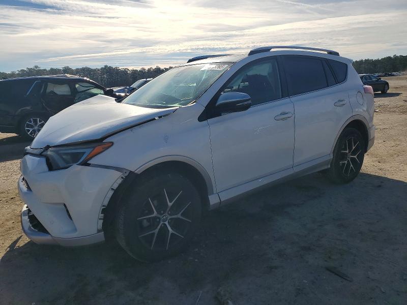 TOYOTA RAV4 2016 with VIN JTMNFREV6GD084017 - Photo from auction