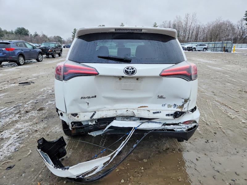 Photo 6 from auction – 2017 TOYOTA RAV4 LE with VIN JTMBFREV0HJ711428