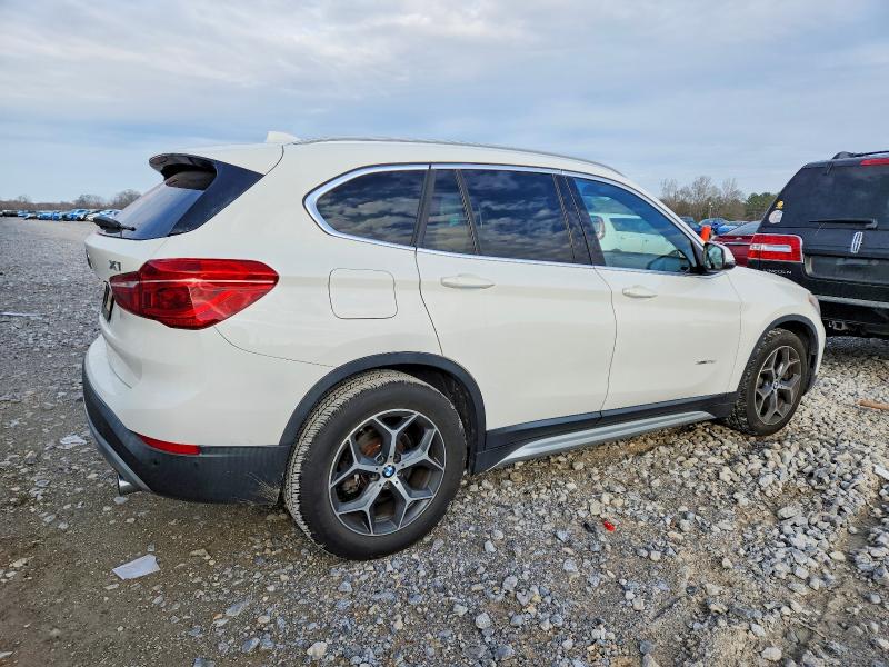 Photo 3 from auction – 2017 BMW X1 with VIN WBXHT3C30H5F68769
