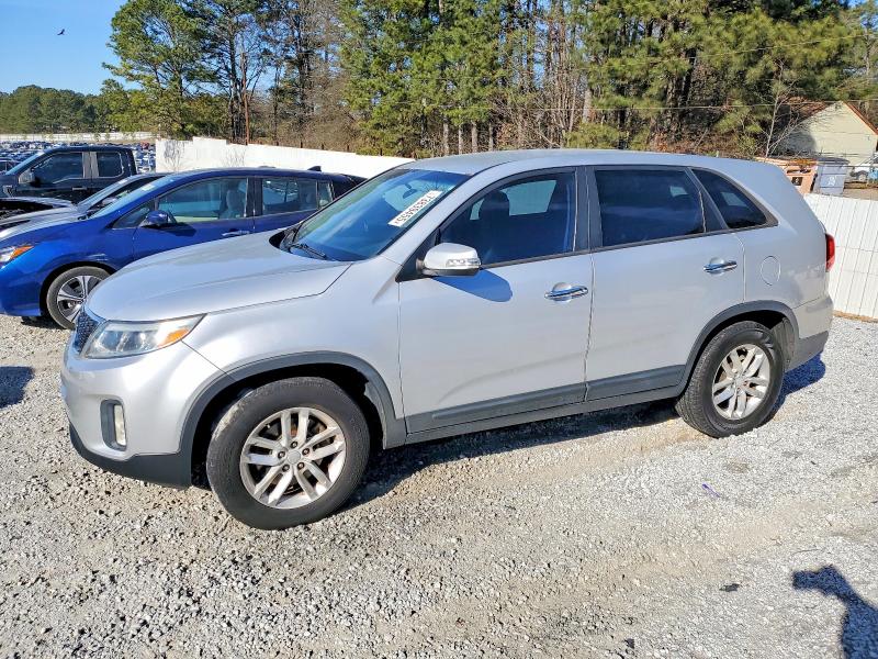 KIA SORENTO LX 2014 with VIN 5XYKT3A61EG487893 - Photo from auction