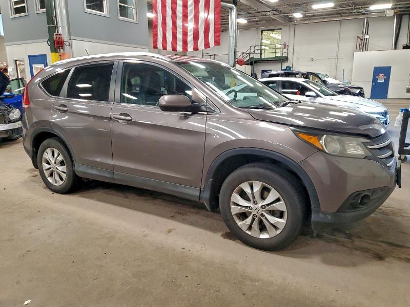 Photo 4 from auction – 2014 HONDA CR-V EXL with VIN 2HKRM4H74EH633888