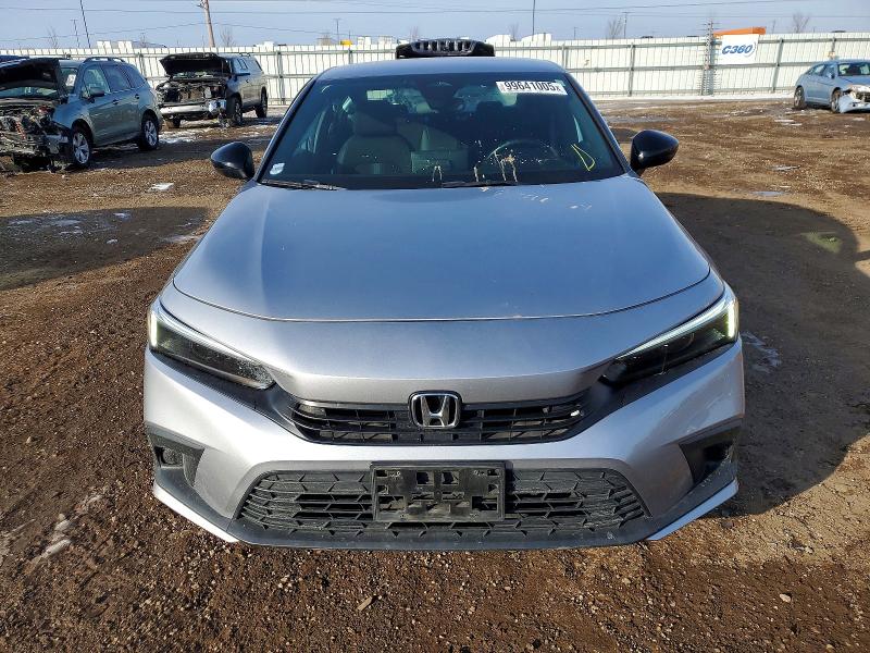 Photo 5 from auction – 2022 HONDA CIVIC SPOR with VIN 2HGFE2F59NH561022
