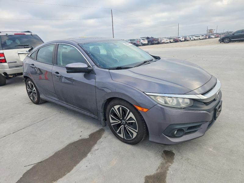 Photo 4 from auction – 2016 HONDA CIVIC with VIN 2HGFC1F39GH642930