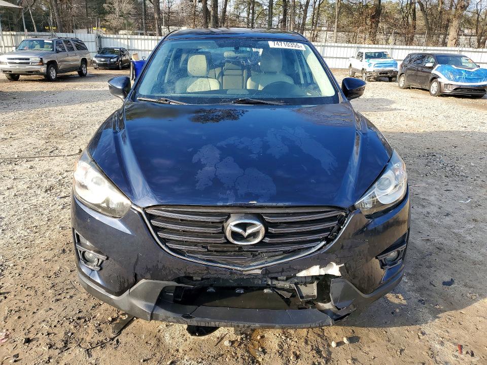 Photo 5 from auction – 2016 MAZDA CX-5 TOURI with VIN JM3KE2CY6G0890495