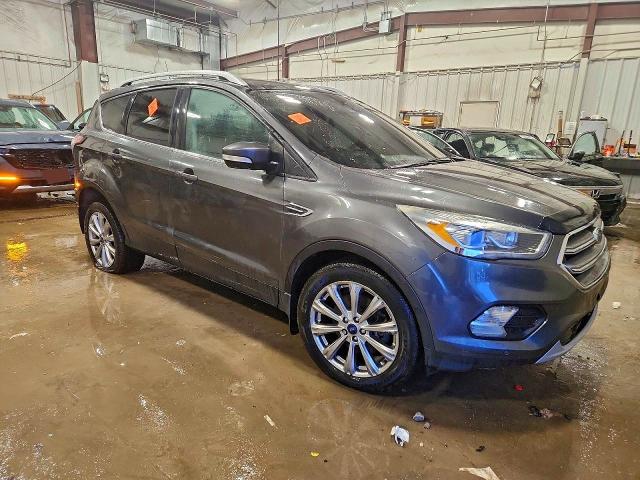 Photo 4 from auction – 2017 FORD ESCAPE TIT with VIN 1FMCU9J90HUD69301