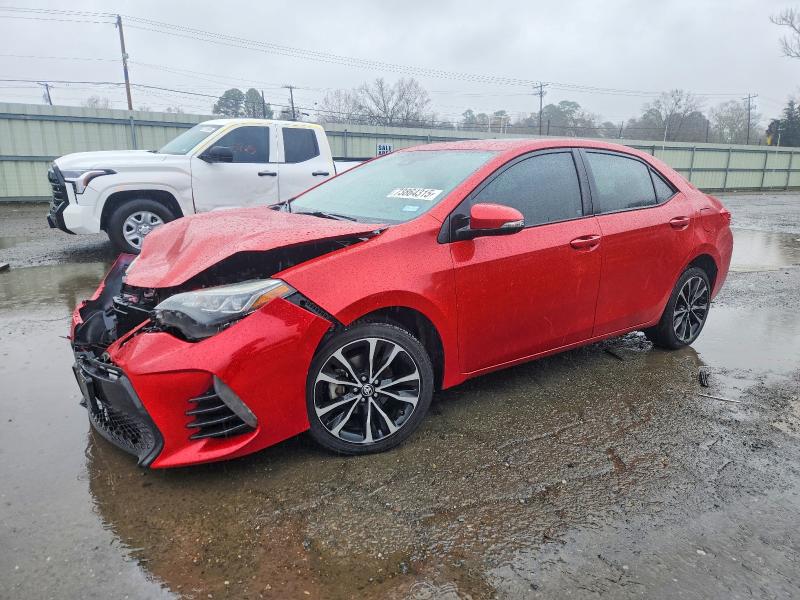 TOYOTA COROLLA L 2018 with VIN 5YFBURHE7JP751590 - Photo from auction
