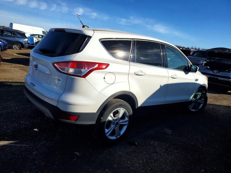 Photo 3 from auction – 2015 FORD ESCAPE SE with VIN 1FMCU9GX9FUC21666