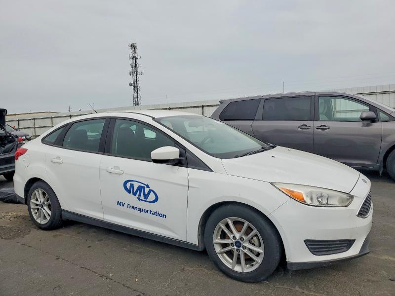 Photo 4 from auction – 2018 FORD FOCUS with VIN 1FADP3F29JL211484