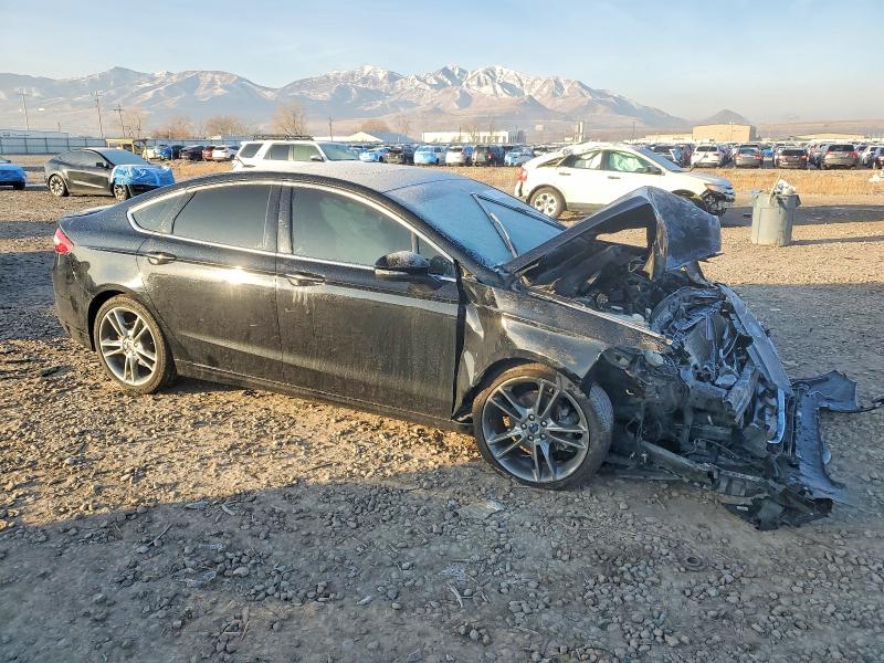 Photo 4 from auction – 2016 FORD FUSION TIT with VIN 3FA6P0K92GR353907