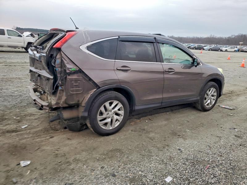 Photo 3 from auction – 2016 HONDA CR-V with VIN 2HKRM3H55GH522987