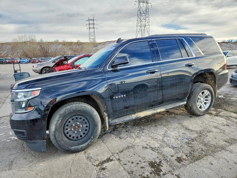 CHEVROLET TAHOE 2019 with VIN 1GNSKBKC4KR299939 - Photo from auction