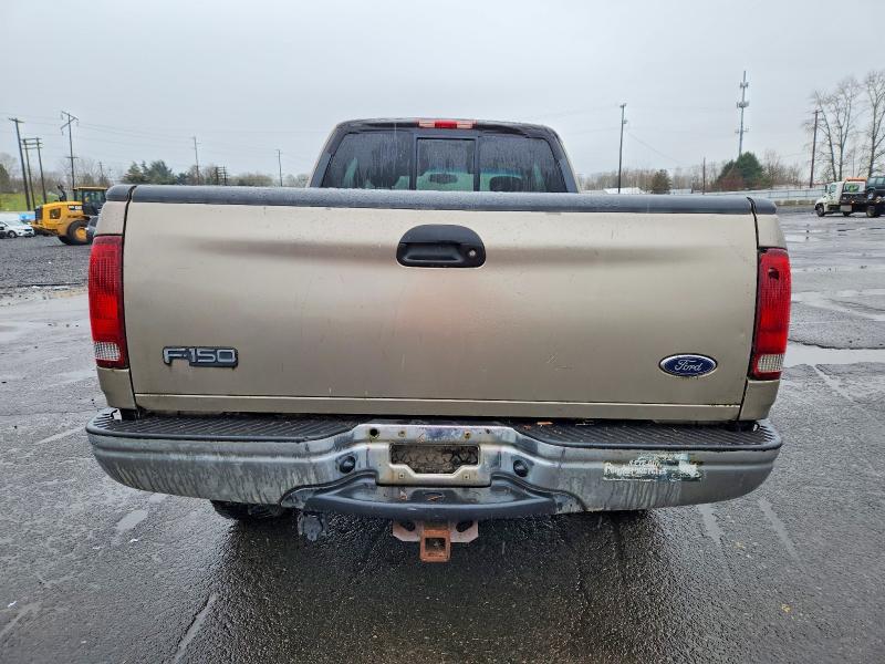 Photo 6 from auction – 2001 FORD F150 with VIN 1FTRX18W71NB70605
