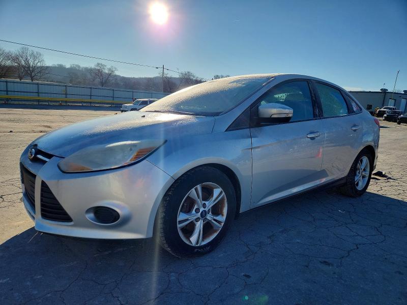 FORD FOCUS 2014 with VIN 1FADP3F20EL426063 - Photo from auction
