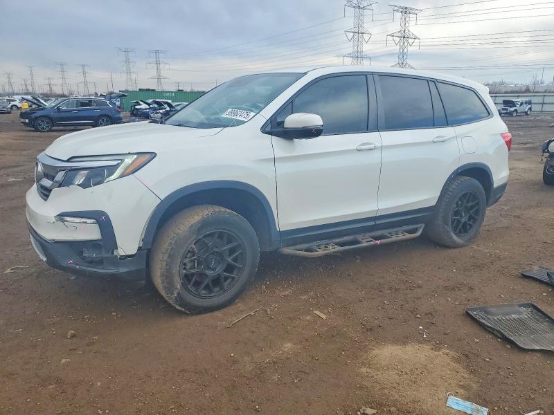HONDA PILOT EX 2021 with VIN 5FNYF6H31MB010935 - Photo from auction