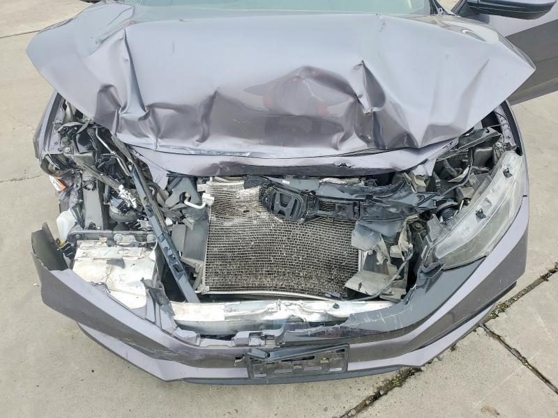 Photo 11 from auction – 2019 HONDA CIVIC SPOR with VIN 19XFC2F83KE201749