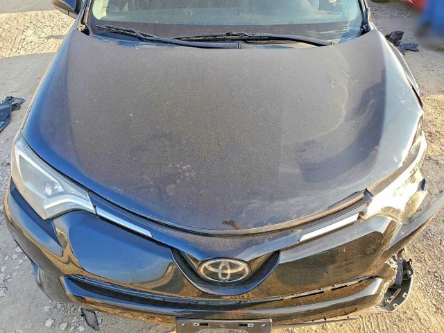 Photo 11 from auction – 2018 TOYOTA RAV4 with VIN 2T3ZFREVXJW450928