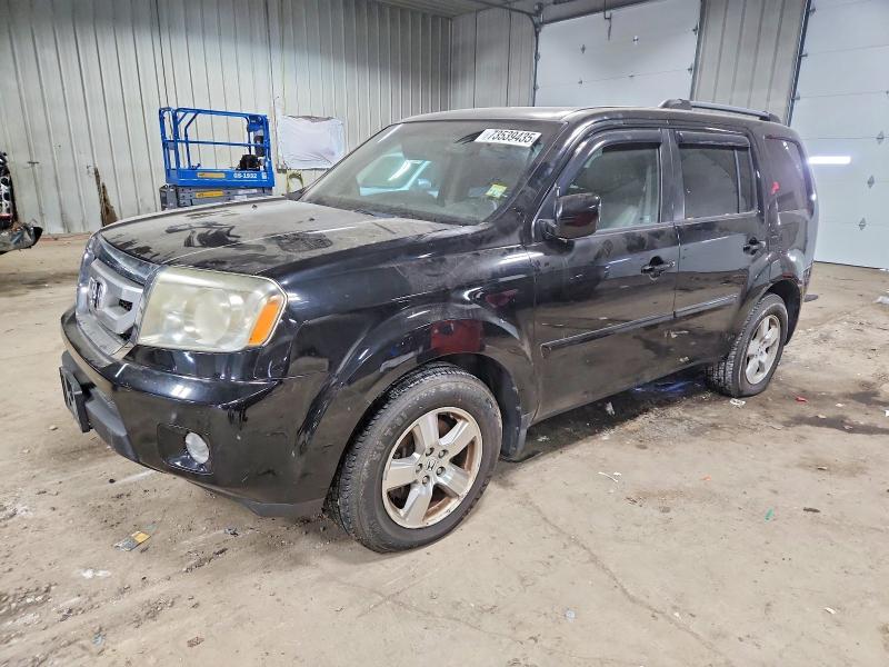 HONDA PILOT EXLN 2011 with VIN 5FNYF4H79BB004661 - Photo from auction