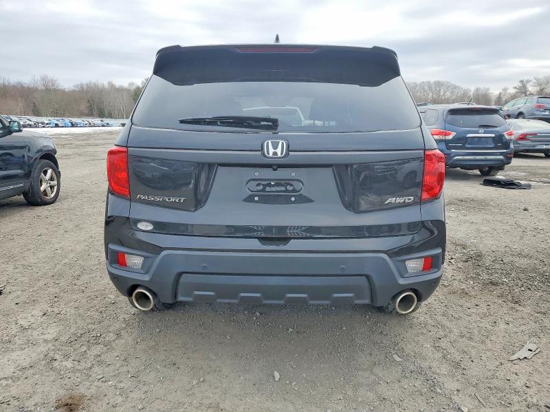 Photo 6 from auction – 2022 HONDA PASSPORT E with VIN 5FNYF8H53NB008098