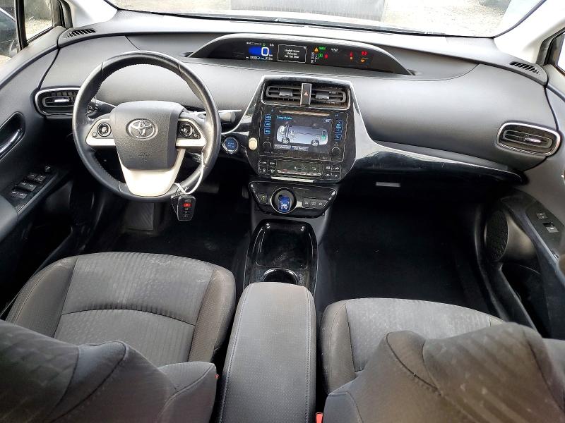 Photo 8 from auction – 2018 TOYOTA PRIUS PRIM with VIN JTDKARFP5J3076506