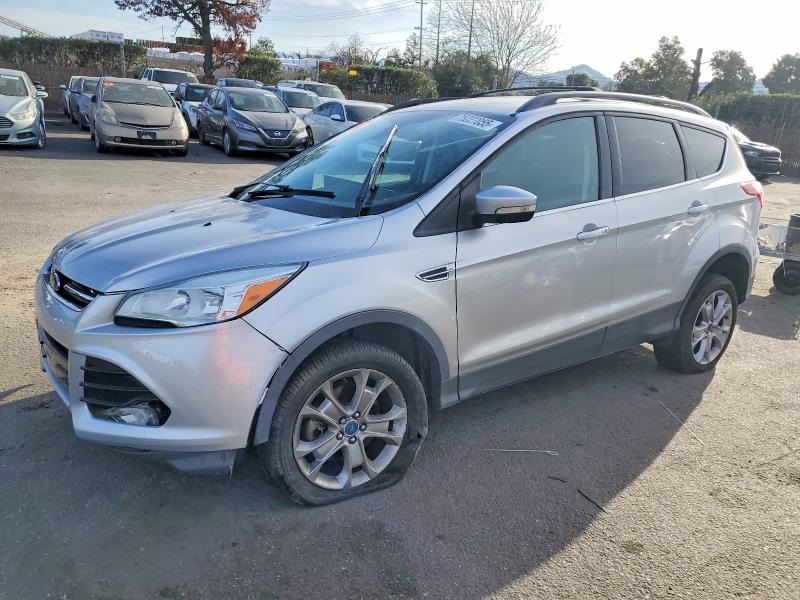 FORD ESCAPE 2013 with VIN 1FMCU9HXXDUC17184 - Photo from auction
