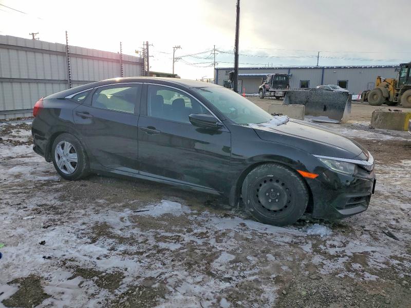Photo 4 from auction – 2016 HONDA CIVIC LX with VIN 19XFC2F55GE018673