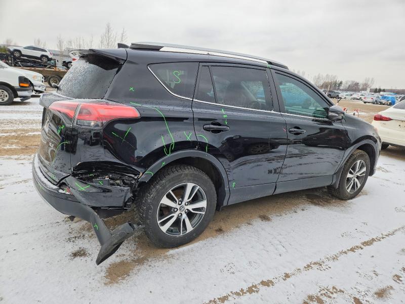 Photo 3 from auction – 2016 TOYOTA RAV4 XLE with VIN 2T3WFREV3GW250419