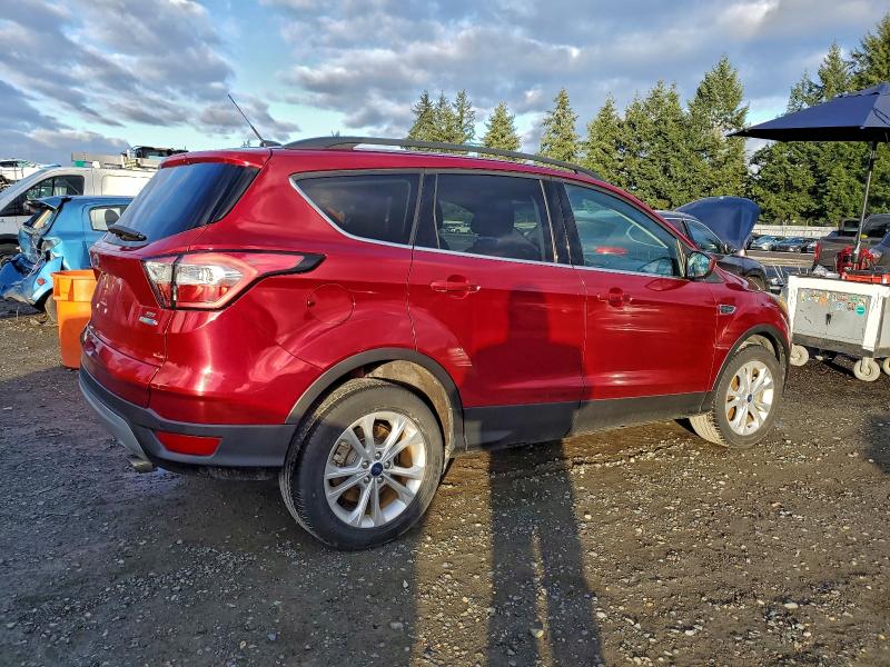 Photo 3 from auction – 2017 FORD ESCAPE SE with VIN 1FMCU9GD0HUC70067