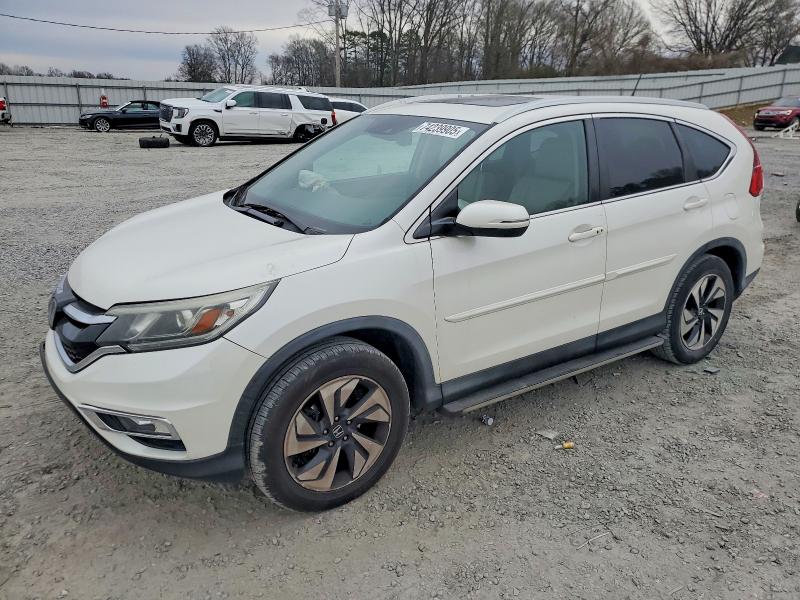 HONDA CR-V TOURI 2016 with VIN 5J6RM4H96GL127117 - Photo from auction