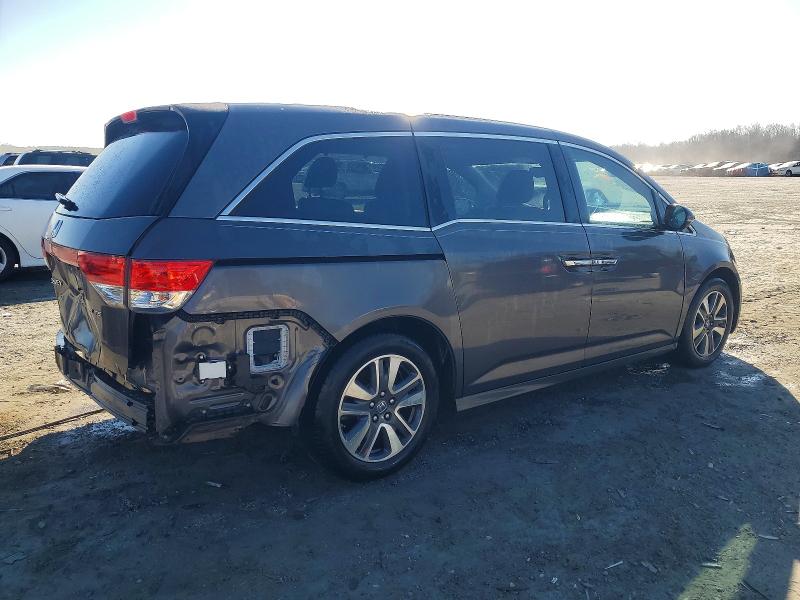 Photo 3 from auction – 2014 HONDA ODYSSEY with VIN 5FNRL5H96EB097731