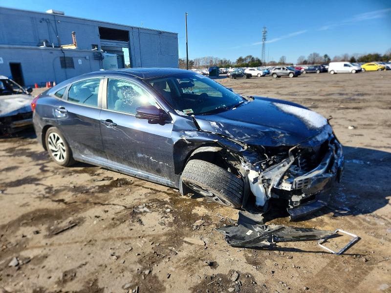 Photo 4 from auction – 2017 HONDA CIVIC EX with VIN 2HGFC2F75HH572093