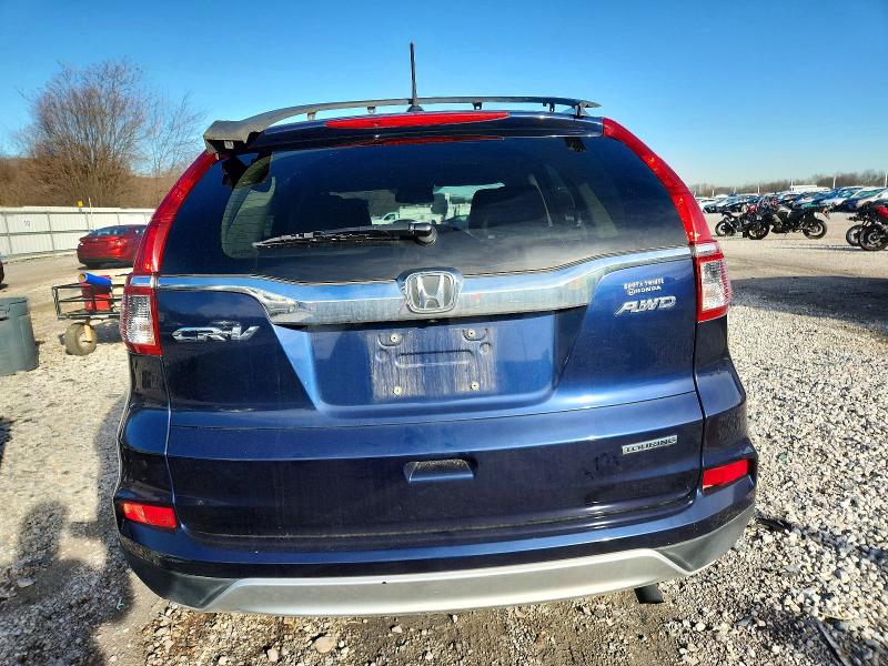 Photo 6 from auction – 2016 HONDA CR-V TOURI with VIN 5J6RM4H94GL070920
