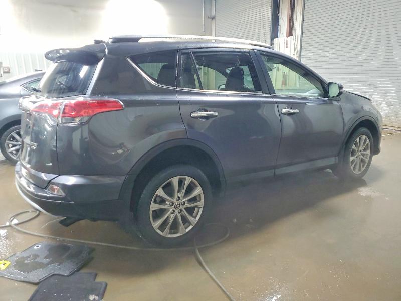 Photo 3 from auction – 2016 TOYOTA RAV4 LIMIT with VIN JTMDFREV1GJ087307