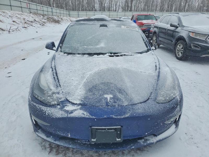 Photo 5 from auction – 2022 TESLA MODEL 3 with VIN 5YJ3E1EAXNF144055