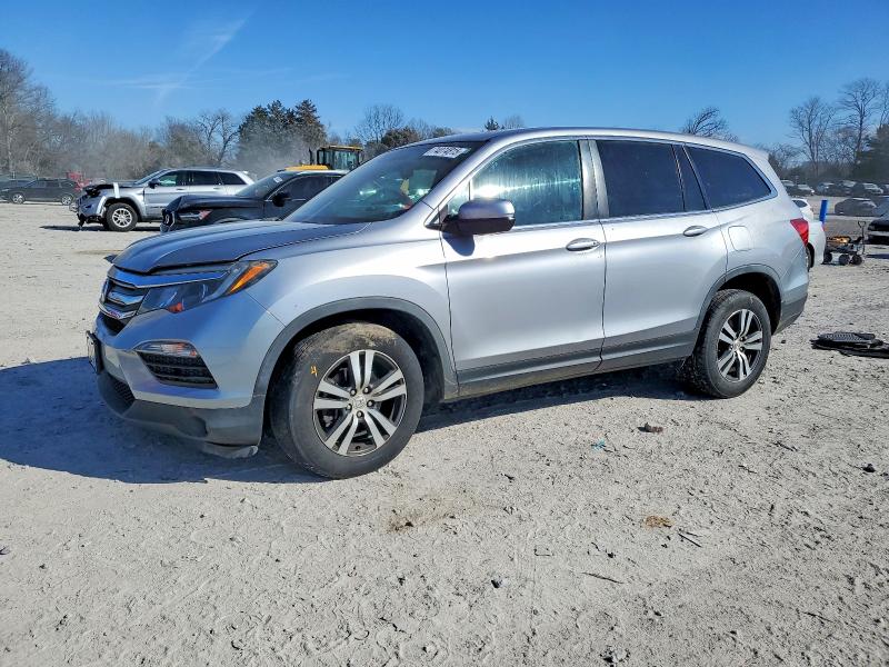 HONDA PILOT 2017 with VIN 5FNYF5H5XHB038993 - Photo from auction
