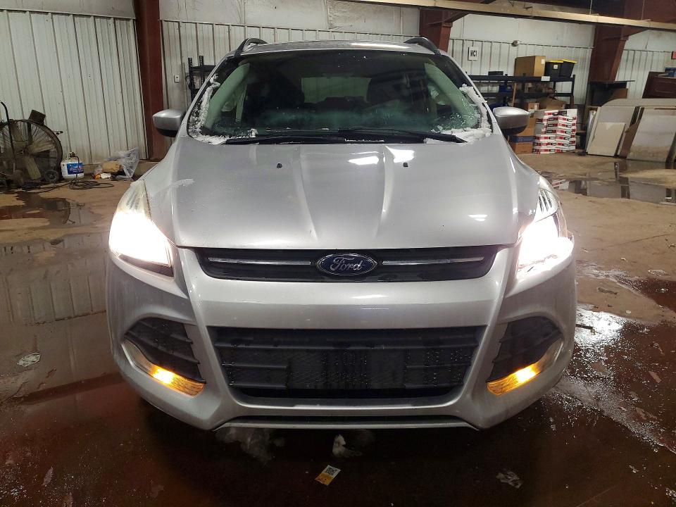 Photo 5 from auction – 2016 FORD ESCAPE SE with VIN 1FMCU9GX0GUA96817
