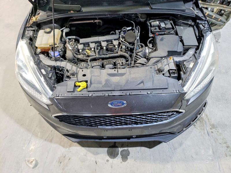 Photo 11 from auction – 2016 FORD FOCUS with VIN 1FADP3F25GL310151