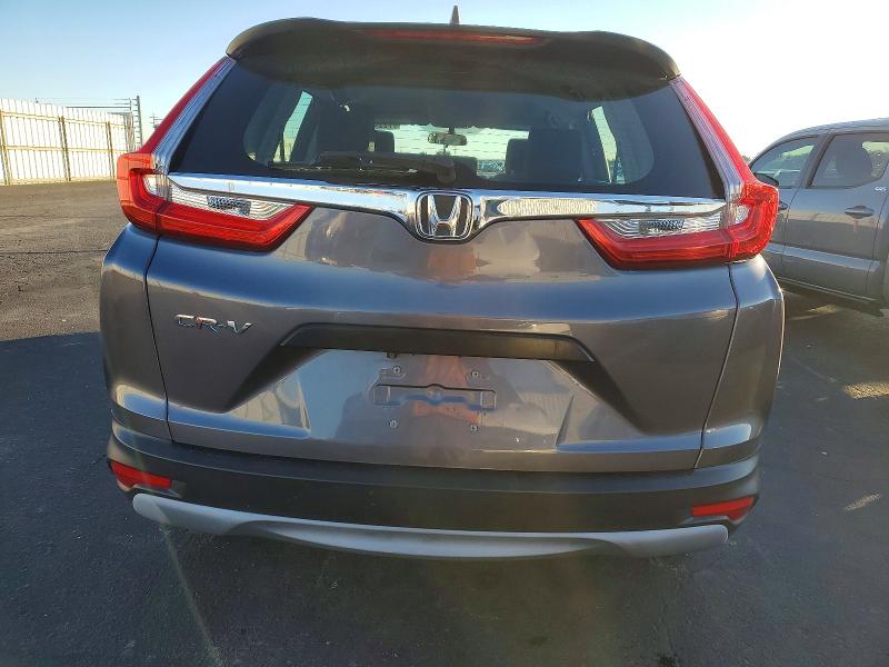 Photo 6 from auction – 2019 HONDA CR-V LX with VIN 5J6RW5H36KL000033
