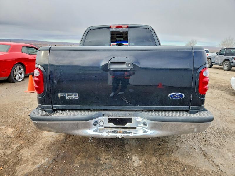 Photo 6 from auction – 2001 FORD F150 SUPER with VIN 1FTRW07L41KB36014