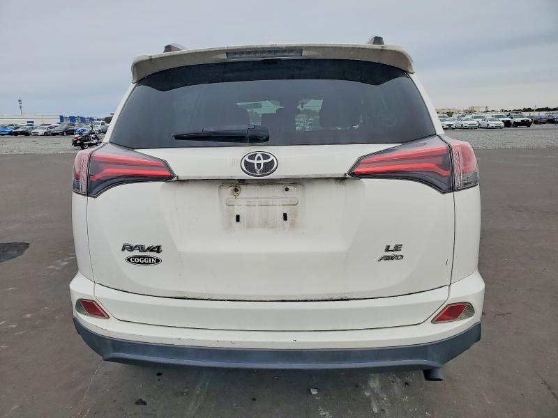 Photo 6 from auction – 2018 TOYOTA RAV4 LE with VIN JTMBFREV3JJ201662