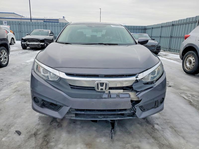 Photo 5 from auction – 2018 HONDA CIVIC with VIN 2HGFC2F68JH035327