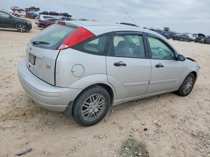 Photo 3 from auction – 2004 FORD FOCUS with VIN 3FAFP37Z54R122117