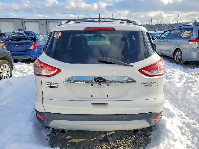 Photo 6 from auction – 2016 FORD ESCAPE TIT with VIN 1FMCU9J99GUB42137