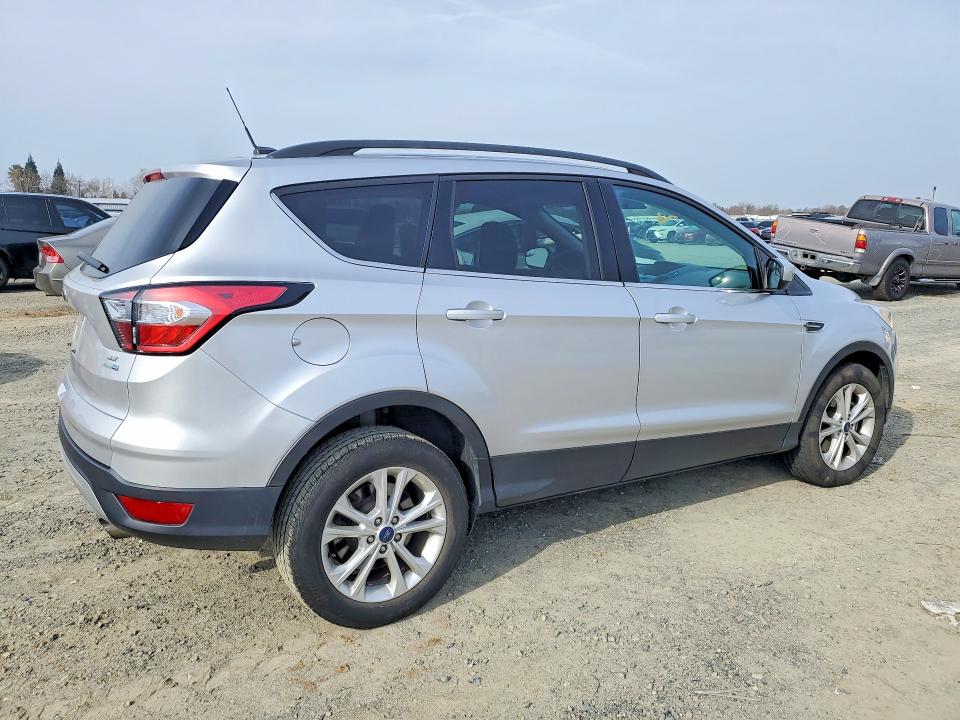 Photo 3 from auction – 2018 FORD ESCAPE SE with VIN 1FMCU9GD4JUA86949