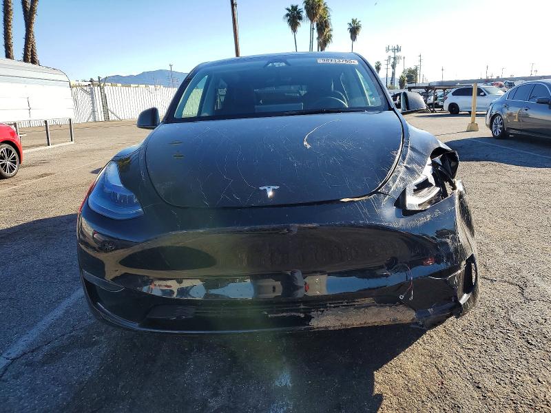 Photo 5 from auction – 2025 TESLA MODEL Y with VIN 7SAYGDED8SA367623