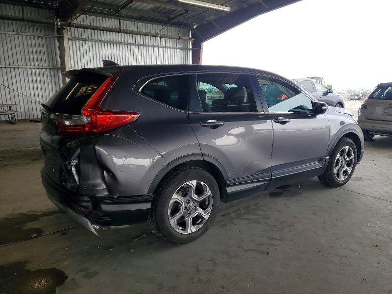Photo 3 from auction – 2018 HONDA CR-V with VIN 7FARW1H87JE034210
