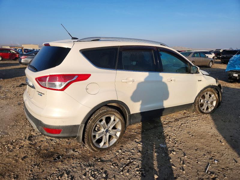 Photo 3 from auction – 2014 FORD ESCAPE TIT with VIN 1FMCU9J90EUA16004